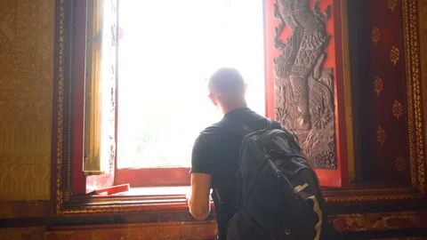 Tourist Walking To Look Out Window of Beautiful Thai Temple Stock Footage 102093175