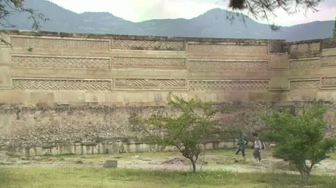 Tourist Walking Near An Ancient Wall Stock Footage