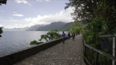 Tourist walking on the pavement Stock Footage 63055387