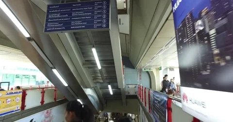 Tourist walking pov of BTS using escalator Stock-Footage 72339454