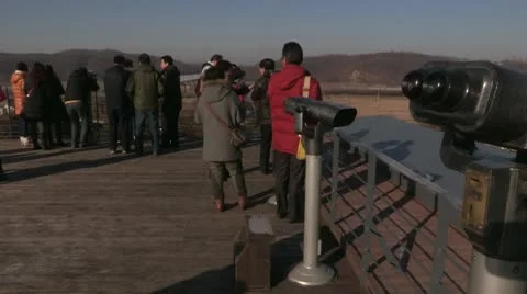Tourist watching the border between North and South Korea Video stock 10574600