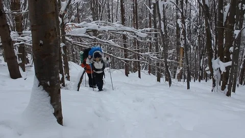 Tourist at the winter mountains Stock Footage 87389174