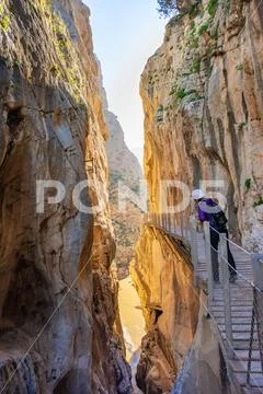 Tourist woman in El Caminito del Rey tourist attraction Malaga, Spain Stock Photos