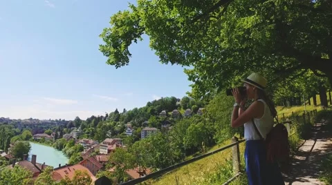 Tourist Woman Taking Photographs in Bern, Switzerland. 4K. Travel Europe. Stock Footage
