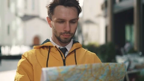 Tourist in yellow jacket Stock Footage 95591520