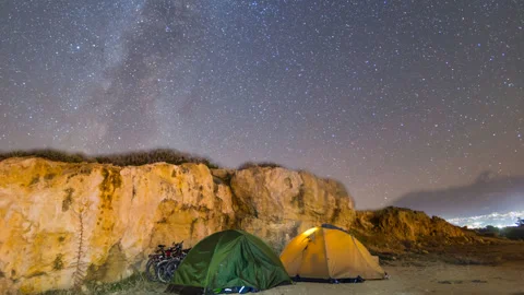 Touristic camp under a starry sky, night travel time lapse scene Stock-Footage 136723029