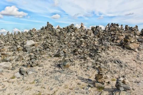Touristic pyramid balanced stack of stones at the tundra Foto stock