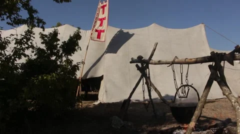 Touristic tent, flag, campfire, trees in the forest Stock Footage 56279314