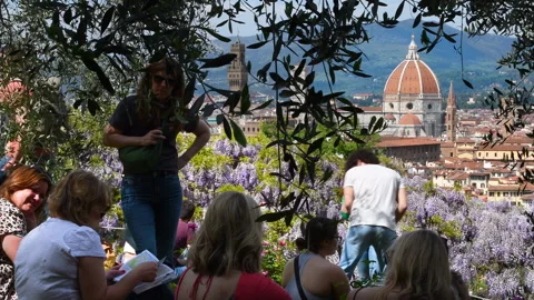 Tourists admire the Cathedral of Florence from Bardini Garden Stock-Footage 248753953
