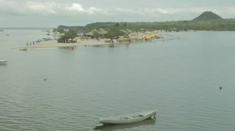 Tourists on a Amazon beach Stock Footage 30602153