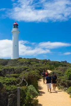Tourists and Split Point Lighthouse on the Great Ocean Road, Australia Stock Photos