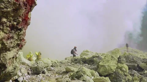 Tourists are in the crater of Ijen volcano,Java Stock Footage 61347202