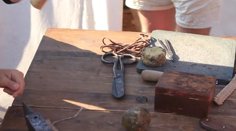 Tourists are Using Hammer, Anvil, Rope During Their Work with the Leather 스톡 동영상 58443052