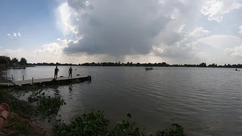 Tourists are using the long-tail service at a pier Stock Footage 117489103