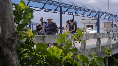 Tourists arrived at the pier. Backpacker Stock Footage