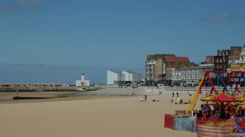 Tourists in background visiting the Margate Main Sands Beach Stock Footage 67578364