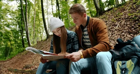 Tourists with Backpacks in Forest Map Stock-Footage 115286254