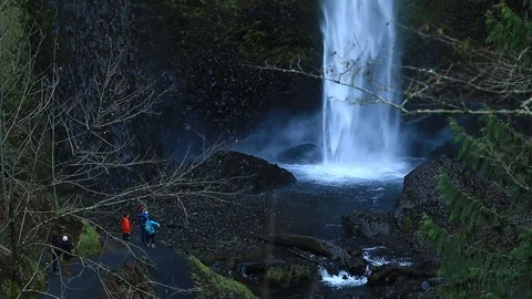 Tourists at Base of Latourell Water Fall in the Columbia River Gorge Oregon Stock Footage 100514668