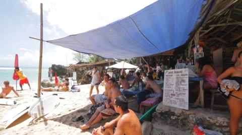 TOURISTS ON THE BEACH Stock Footage 27333209