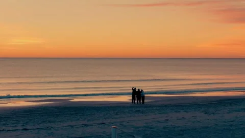 Tourists on a beach making selfie Stock Footage 328661099