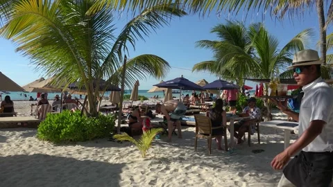 Tourists in the beach-side bar at North beach of Isla Mujeres. Mexico Stock Footage