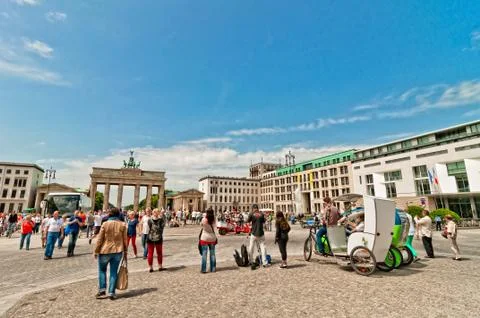 Tourists at Brandenburg Gate in Berlin Stock Photos