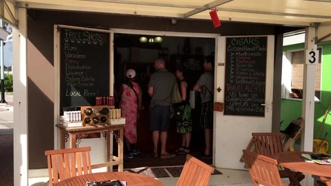 Tourists in Caribbean store Stock Footage 73555901