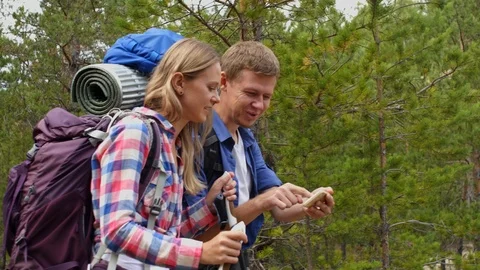 Tourists checking direction with navigator Stock Footage 118543025