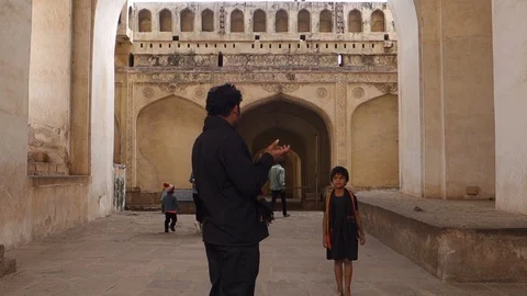Tourists clapping hands- Acoustic system at Golconda Fort Stock Footage 99341316