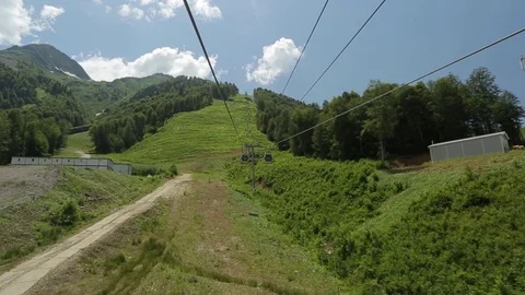 Tourists climb the funicular in the mountains Stock Footage 73367694