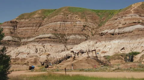 Tourists Climbing the Hoodoos of Drumheller Stock Footage 46417502