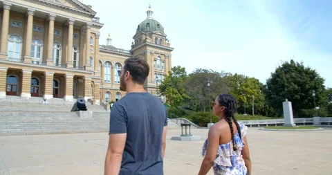 Tourists, Couple at the Des Moines Iowa State Capitol, Daytime Stock Footage