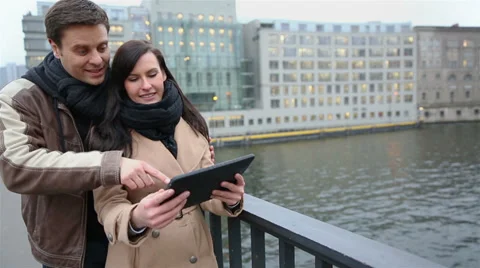 Tourists couple navigating with tablet computer Stock Footage 33402920