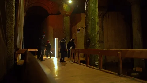 Tourists at the crying column in the Basilica Cistern Stock Footage 112297766