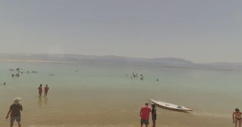 Tourists at the Dead Sea, Israel. Drone footage 4k Stock Footage