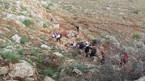 Tourists descend from the mountains 2 Video stock 64058461