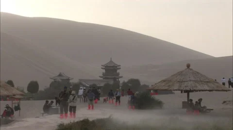 Tourists in desert, China Stock Footage 56606845