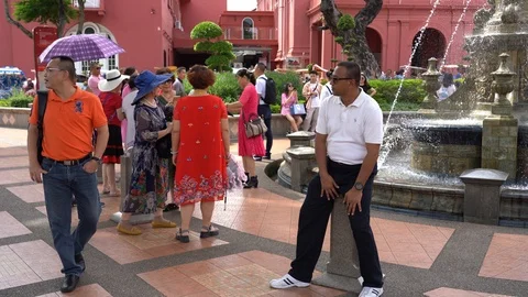 Tourists from different countries on the Dutch square in Malacca Stock Footage 111634427