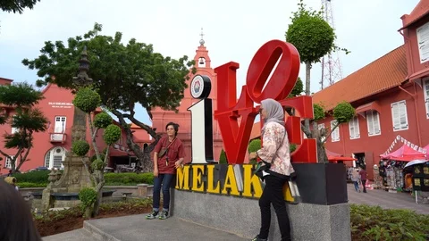 Tourists from different countries on the Dutch square in Malacca Stock Footage 111636125