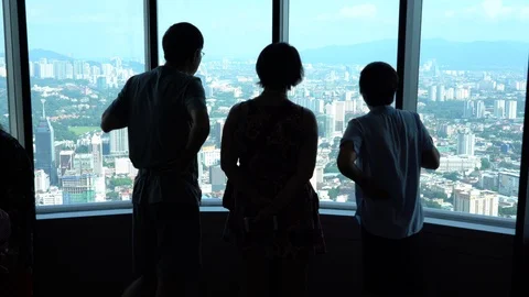 Tourists from different countries on the observation deck of the Petronas Stock Footage 111233885