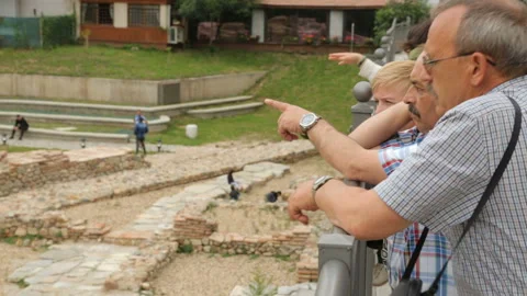 Tourists discussing ruins in Sofia Stock Footage 96090455