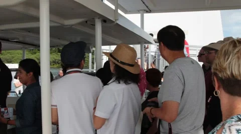 Tourists Disembark from Boat to USS Arizona Memorial at Pearl Harbor Stock Footage