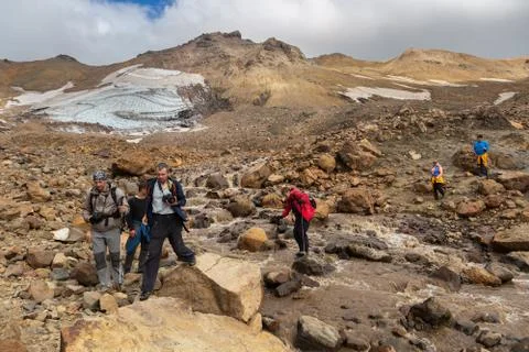 Tourists during the ascent to the active volcano Mutnovsky in Kamchatka. Stock Photos