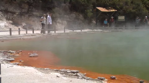 Tourists by edge of boiling lake Stock Footage 3018844