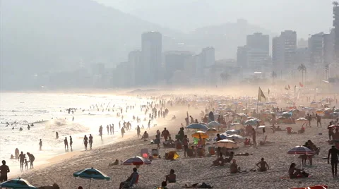 Tourists enjoying the famous Ipanema beach, Rio de Janeiro, Brazil. Stock Footage