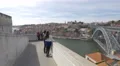 Tourists enjoying the view of Dom Luis Bridge in Porto 4k or 4k+ Resolution