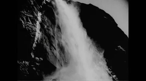 Tourists enjoying the view of Yosemite Falls at Yosemite National Park Stock Footage