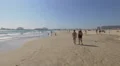 Tourists enoying the beach and kids playing in the sand, Porto 4k or 4k+ Resolution