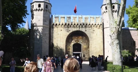 Tourists enter the Gate of Salutation at Topkapi Palace, Istanbul Stock Footage 321047700