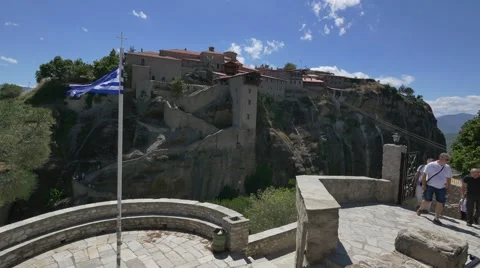 Tourists exiting the Monastery of the Great Meteoron Stock Footage 66313610